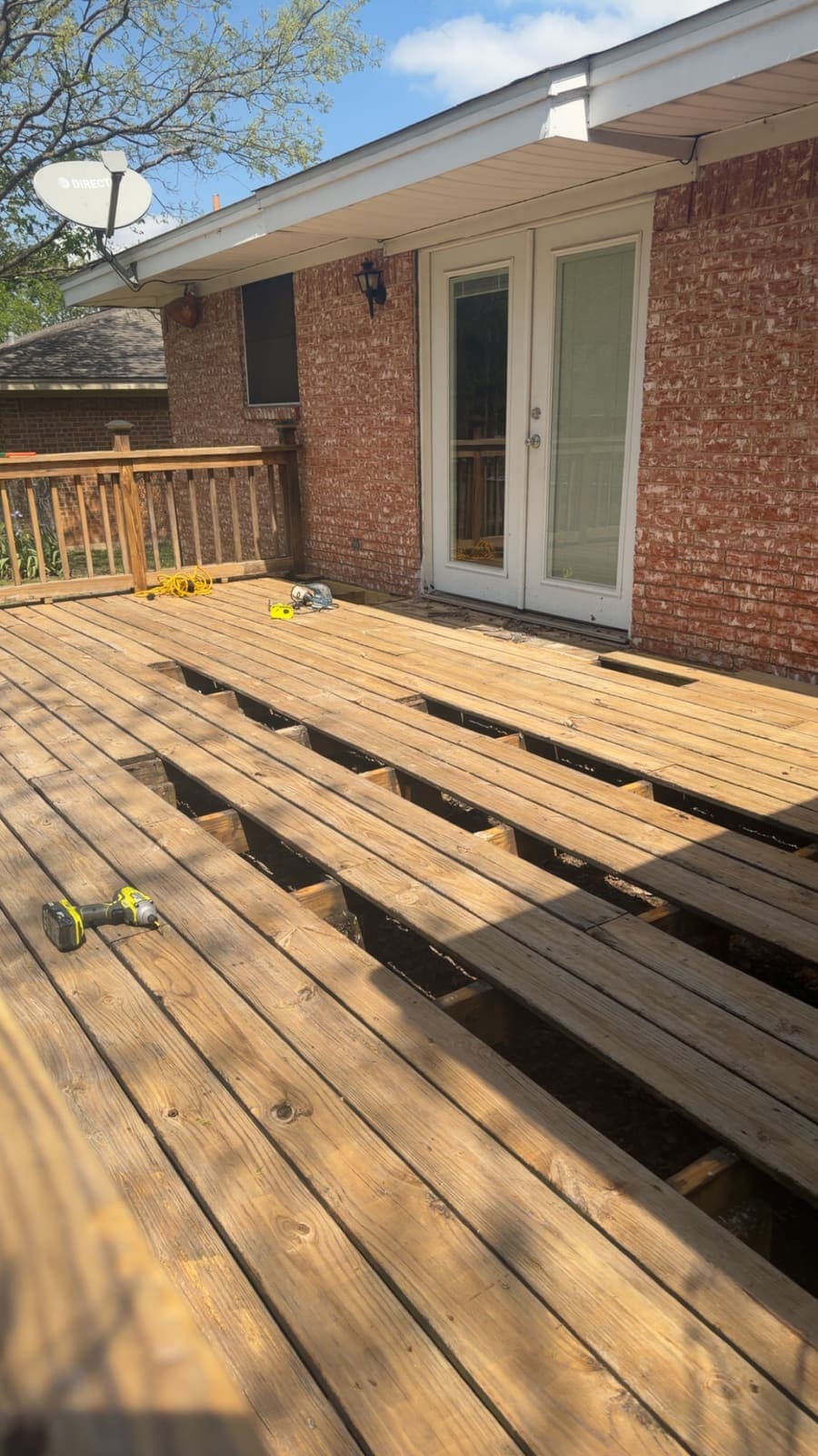 Deck boards open during a repair.